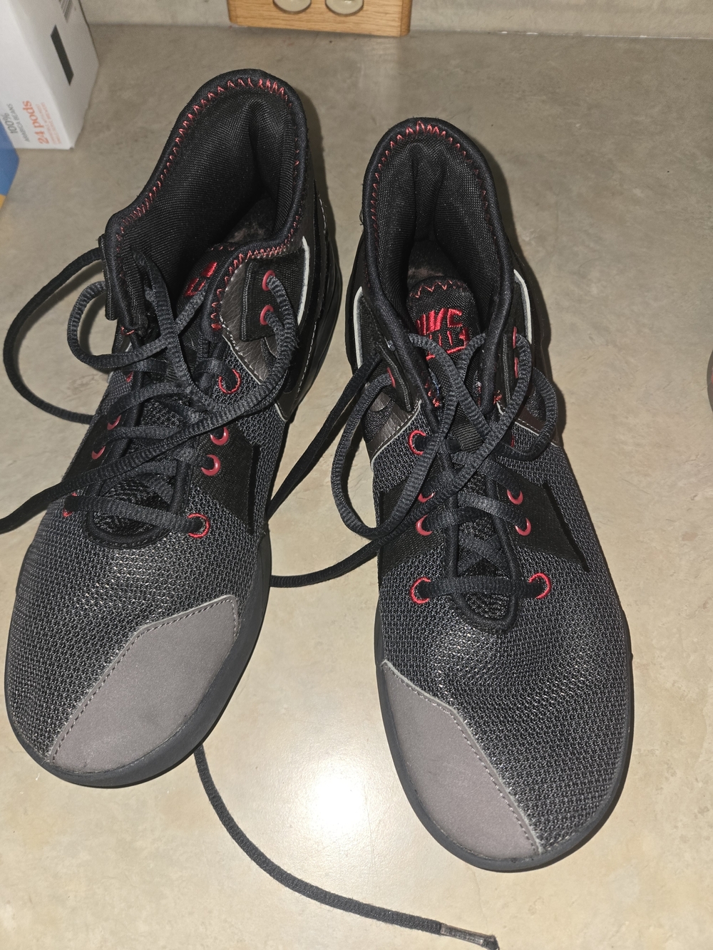 Nike Men's Black Basketball Shoes with Red Eyelets and Gray Toe